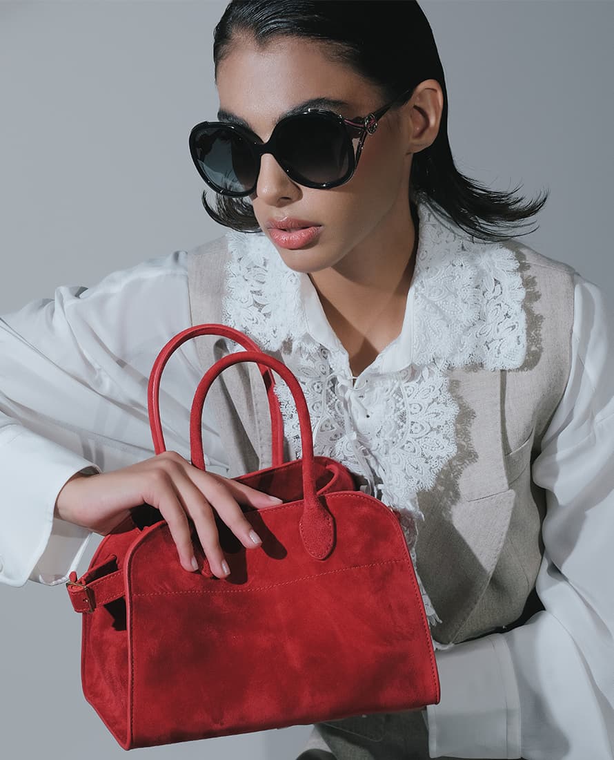 Gucci - Sunglasses; The Row - Margaux 10 suede bag. Магазин женской и мужской одежды Ла Галерея Ереван, Армения.
